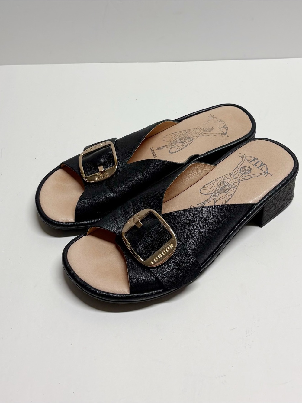 Fly London Black Leather Buckle Mule Sandals